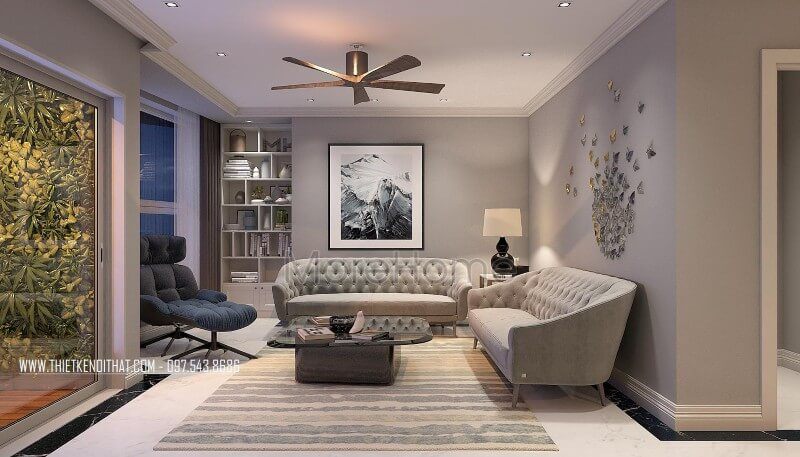 Bộ sofa bọc nỉ cao cấp được lựa chọn cùng tông màu xám của mảng tường tạo sự mới lạ, hiện đại cho không gian phòng khách.